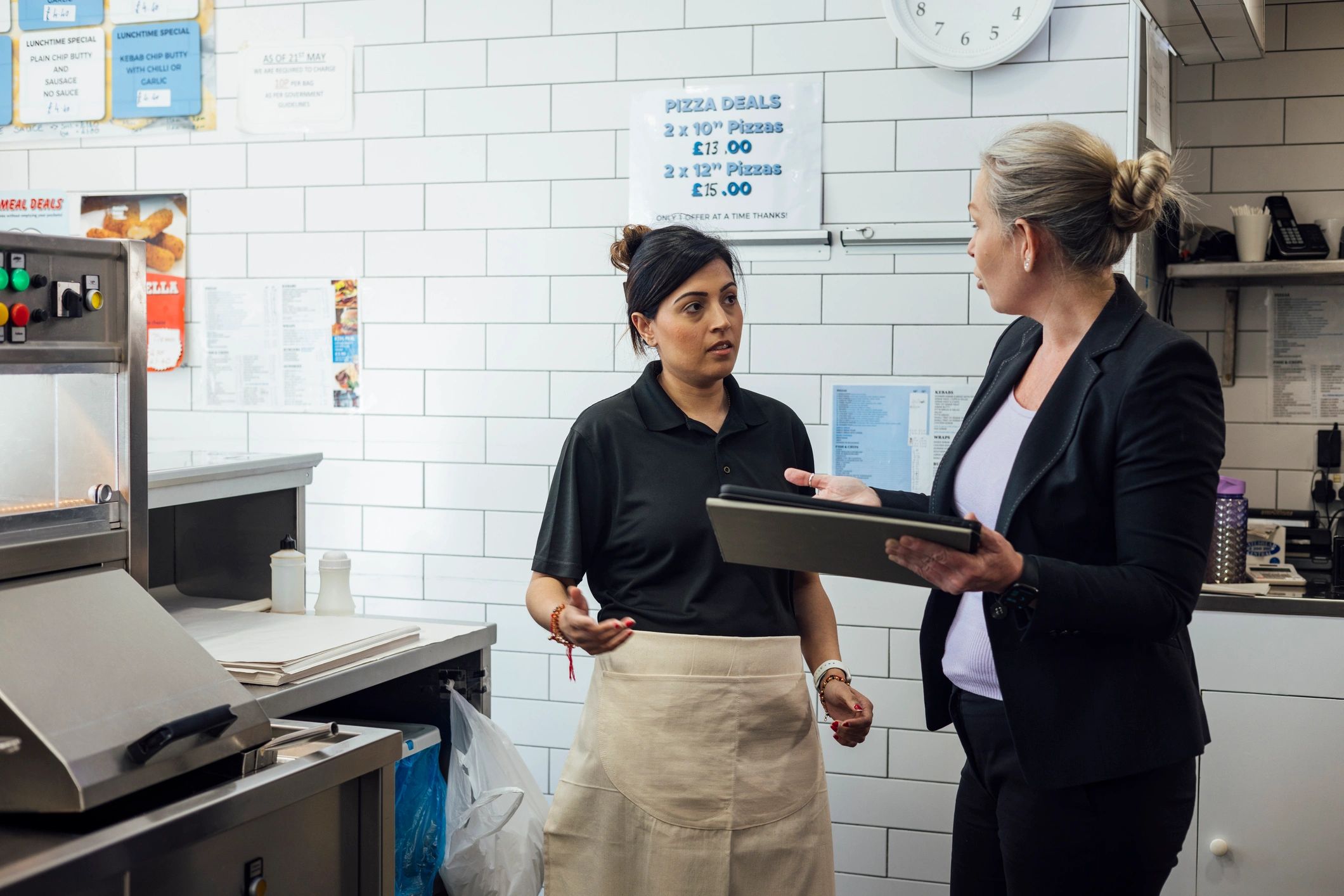 Business owner speaking with a financial advisor