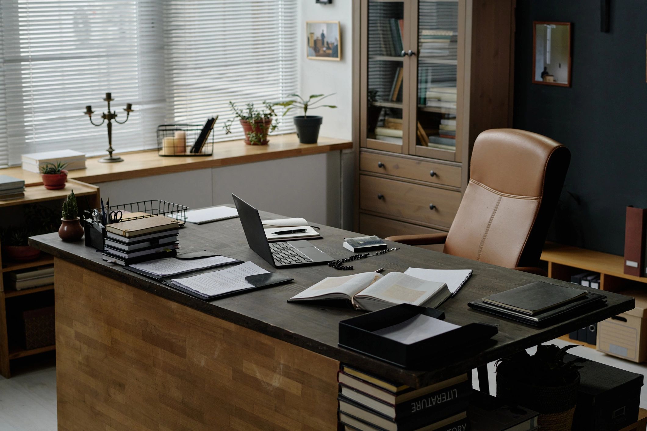 Professional bookkeeping workspace with laptop and desk setup